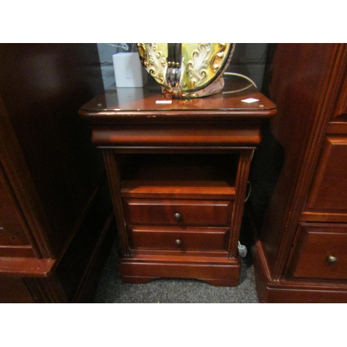 1038 - A pair of Victorian style cherry wood bedside cabinets, each with an alcove over two drawers, bracke... 