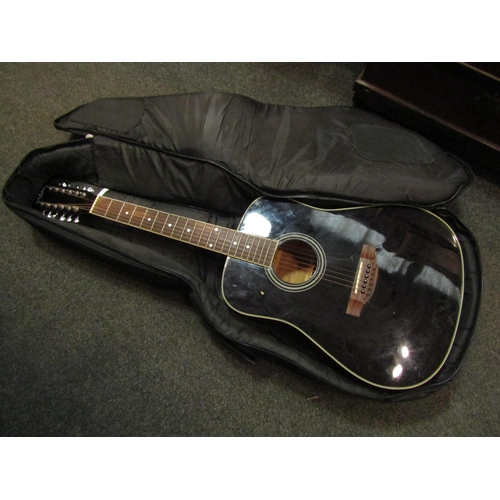 1064 - A Carlo Robelli twelve string acoustic guitar in soft case, missing some strings   (R) £45