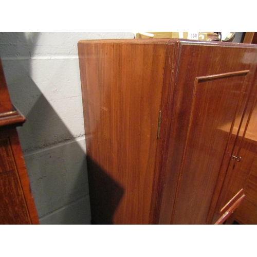 1069 - A late Victorian mahogany cabinet, the two doors opening to reveal shelf space with under-tier, on s... 