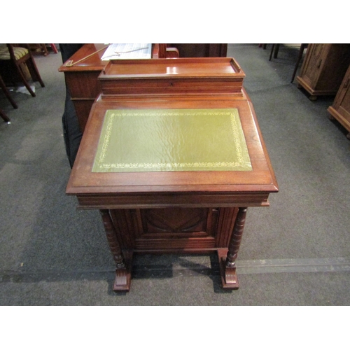 1125 - An Edwardian Davenport with gilt tooled leather insert and four drawers, 90cm high x 59cm wide x 55c... 