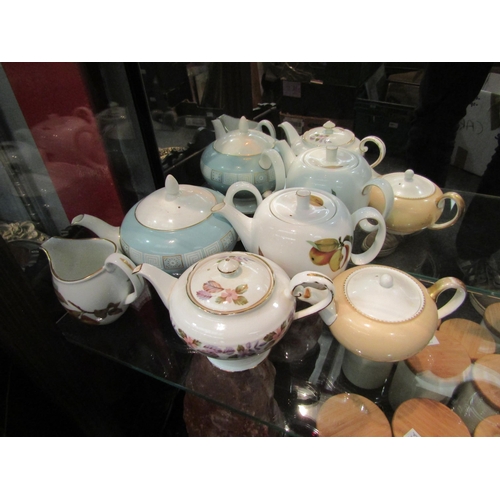 1438 - Four modern teapots and jug including Worcester Evesham, Wedgwood & Aynsley 'April Rose' (5)   (E)  ... 