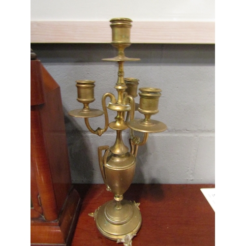 1071A - A pair of brass candelabra in the neo-classical style   (E) £20-30