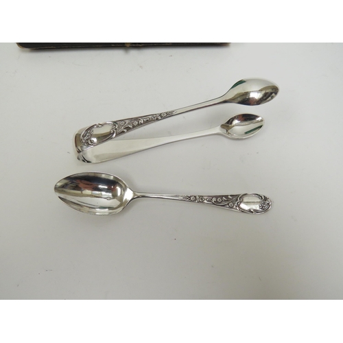 5002 - A set of six William Briggs & Co. silver coffee spoons and a pair of matching tongs in fitted case, ... 