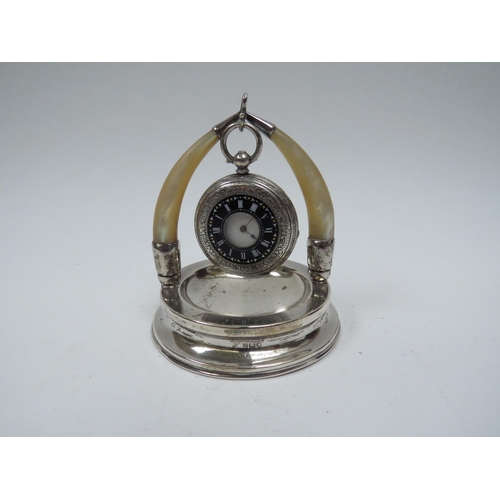 5010 - A silver pocket watch stand with Mother of Pearl fashioned horns, London 1907, weighted base and Con... 