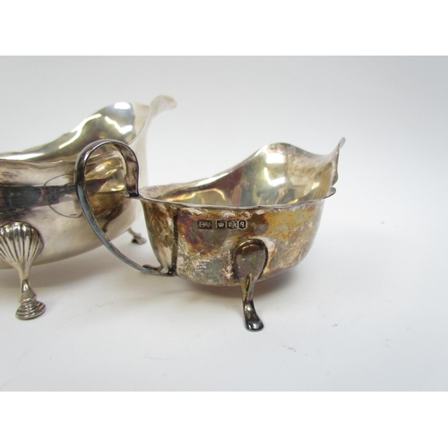 5023 - A silver sauce boat with S-Scroll handle and hoof feet, London 1942 and smaller Emile Viner sauce bo... 