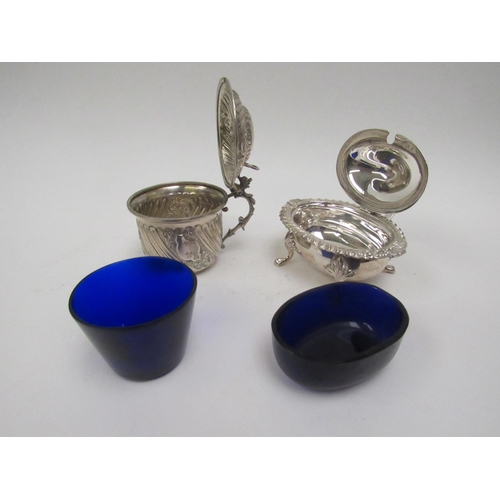 5026 - A Victorian Charles Edward silver mustard wrythen form, London 1895, with blue glass liner, 7cm tall... 