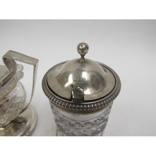 5027 - A Continental silver topped mustard with crystal glass body and a George III silver topped mustard (... 