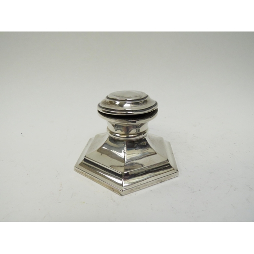 5039 - A silver capstan inkwell (lacking liner), dents to top, weighted base, 10cm long, date letter rubbed