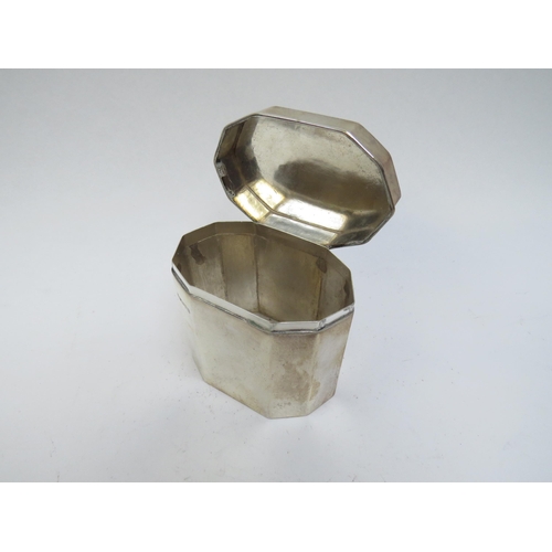 5044 - An Alfred Marston silver tea caddy, handle mounted to top, faceted body, Chester 1920, 8.2cm x 9cm x... 