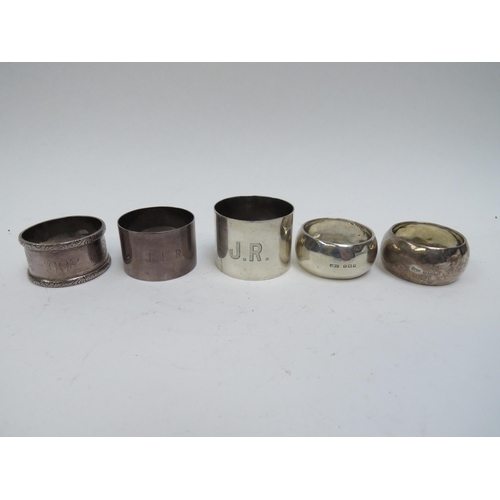 5045 - Five various silver napkin rings including monogrammed, various makers and dates, 137g