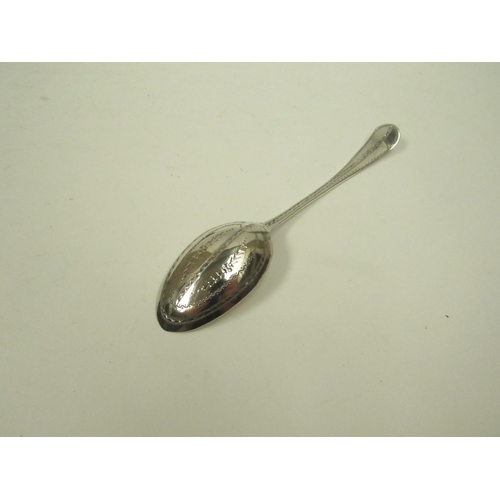 5068 - A silver spoon with bright cut detail marks indistinguishable in Mappin & Webb case, 24g