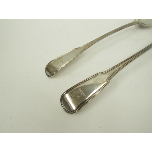 5075 - A pair of William Sumner I silver basting / stuffing spoons, family crest to terminal, London 1803, ... 