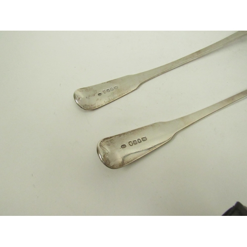 5075 - A pair of William Sumner I silver basting / stuffing spoons, family crest to terminal, London 1803, ... 