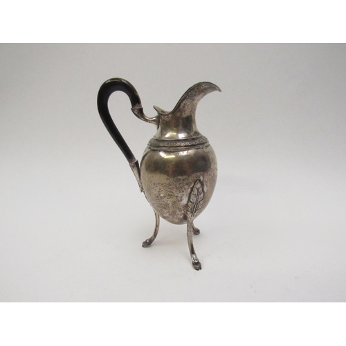 5078 - A Continental silver jug raised on three hoof feet, base marked 800, possibly Spanish, 14cm tall, 12... 