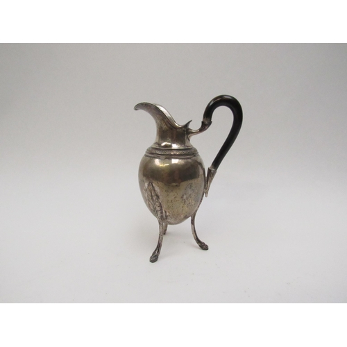 5078 - A Continental silver jug raised on three hoof feet, base marked 800, possibly Spanish, 14cm tall, 12... 