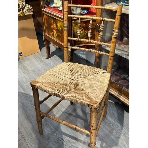 5523 - A set of four Regency bamboo effect chairs, turned spindle back supports, seagrass seats, one spindl... 