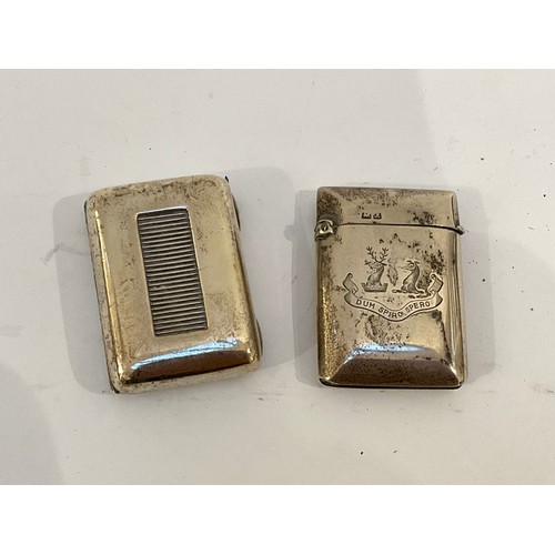 5049 - Two silver vesta cases one with Armorial crest, 45g