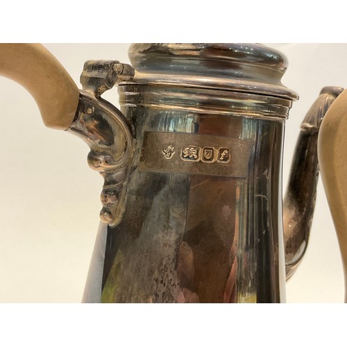 5101 - A C.J. Vander Ltd silver coffee pot and matching hot water jug in the 18th Century style, treen hand... 