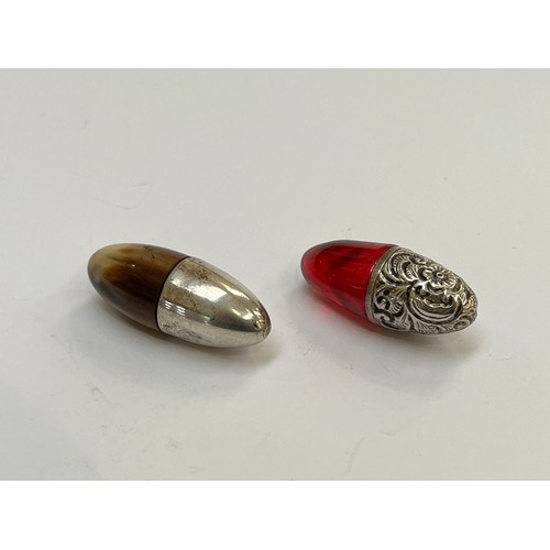 5216 - Two ovoid form scent bottles, one horn and silver, the other ruby glass and white metal, approximate... 