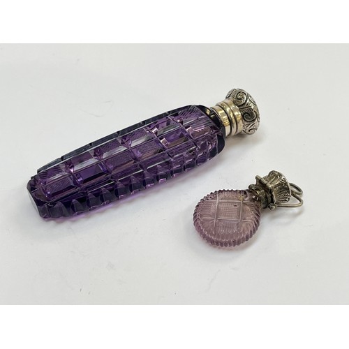 5217 - An amethyst glass scent bottle with rectangular cut panelled sides, white metal embossed lid, togeth... 