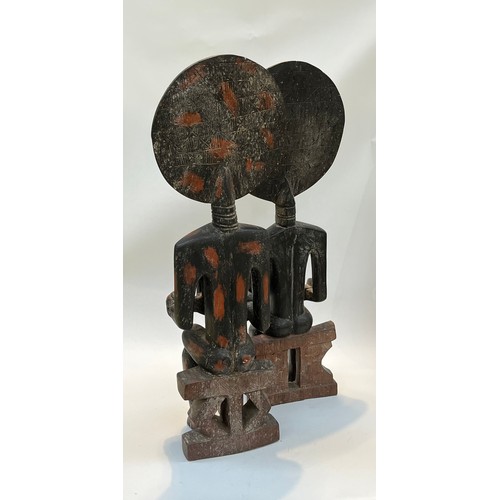 5228 - A pair of Northern Ghanaian carved wood fertility figures, standing 90cm and 92cm tall