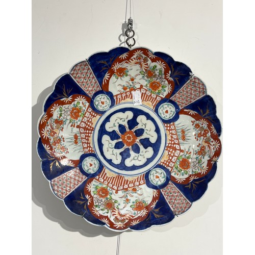 5229 - A Chinese scalloped form charger, Imari palette