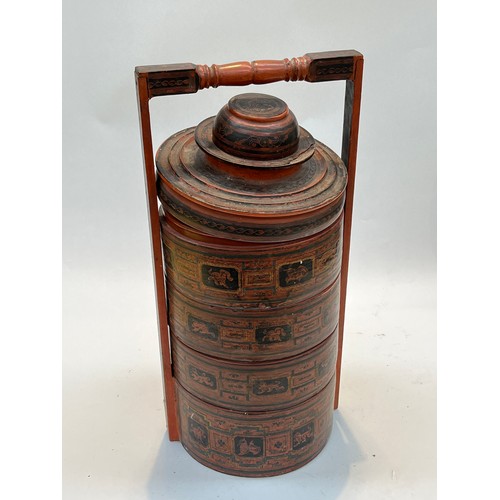 5235 - A Burmese lacquered tiffin box, multiple sections used for transporting food to the paddy fields    ... 