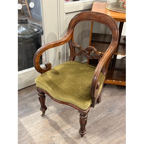 5240 - A circa 1840 scroll arm mahogany balloon back open armchair in the manner  of 'James Shoolbred' the ... 