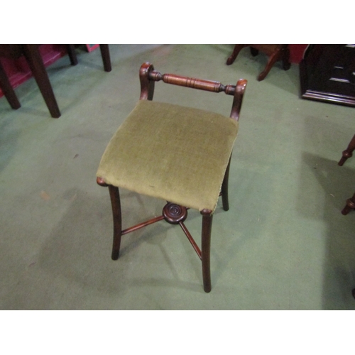 4078 - Circa 1900 a music stool the turned back rest over outswept legs united by an 