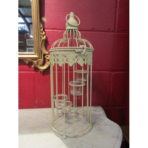 4087 - A decorative bird cage form candle holder, 48cm high    (R) £0