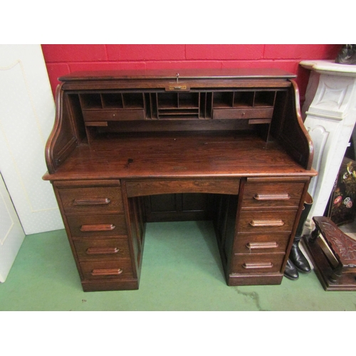 4139 - An Edwardian panelled oak twin pedestal desk the 