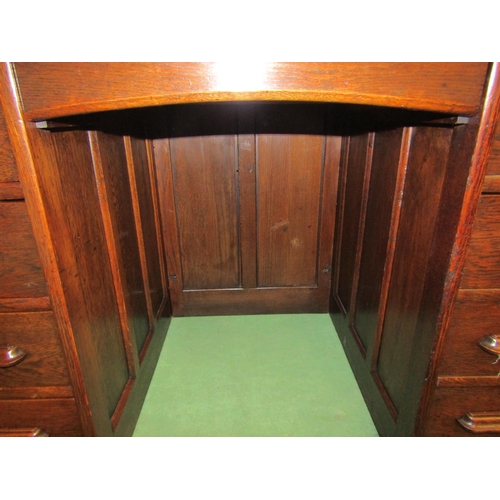 4139 - An Edwardian panelled oak twin pedestal desk the 