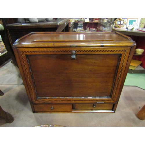 4151 - A late Victorian inlaid mahogany table top stationery cabinet with drop down front, the fitted inter... 