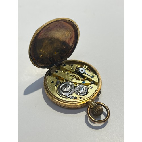 5715 - A Continental lady's fob watch with stooled face and ornate case stamped 18k, 30g