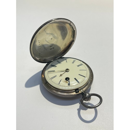 5717 - An English silver pocket watch with black Roman numerals to the white enamel face, the movement engr... 