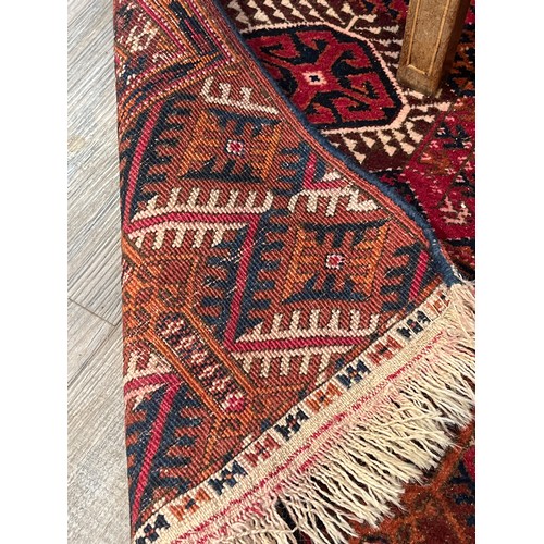 5718 - A Turkoman woven silk rug, five rows of guls, multiple borders, tasselled ends, 362cm x 240cm