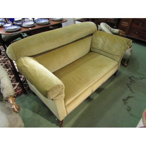 4108 - An Edwardian green velour drop down sofa with hump back on castors    (R) £40