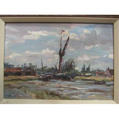 4023 - ANDREW KING (1956): An oil on board, beached wherry boats, Norfolk scene, signed lower-left, 27.5cm ... 