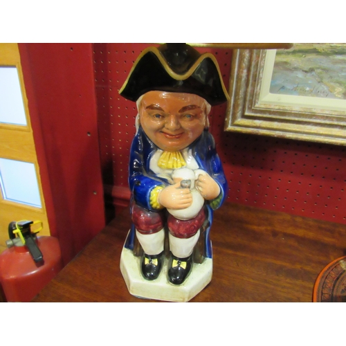 4024 - A Staffordshire Toby Jug style table lamp with cream shade, 40cm tall with shade   (R) £20