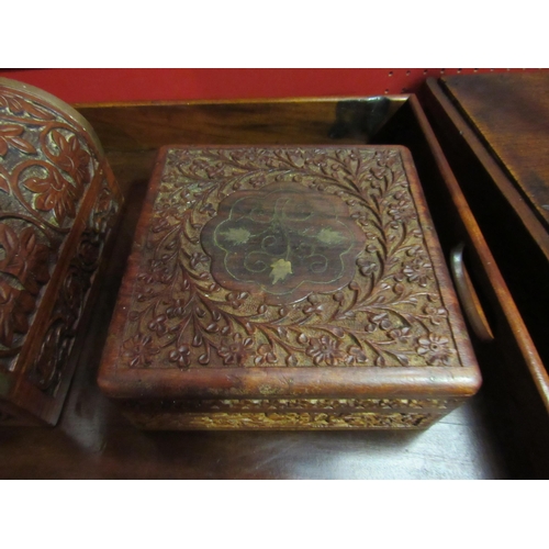 4053 - Two Indian carved hardwood jewellery boxes, 16cm long   (R) £0