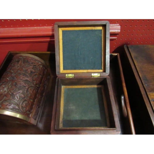 4053 - Two Indian carved hardwood jewellery boxes, 16cm long   (R) £0