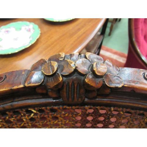 4066 - A 19th Century style French fauteuil armchair with cane backrest and carved decoration