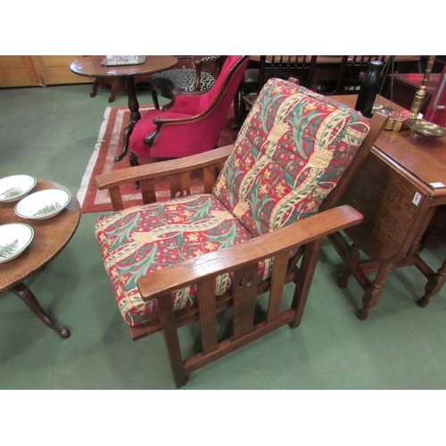 4070 - An Arts & Crafts oak recliner chair with William Morris upholstery