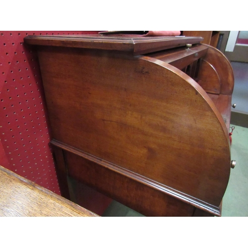 4076 - An Edwardian crossbanded mahogany cylinder bureau the fitted interior with brushing slide writing ta... 