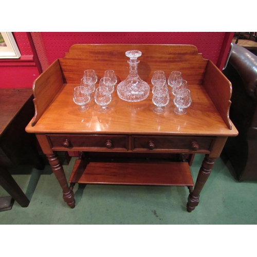 4095 - Circa 1860 a mid Victorian flame mahogany washstand the three quarter raised back over two frieze dr... 