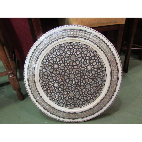 4096 - A painted and mother of pearl inlaid circular tray, 50cm diameter   (R) £25