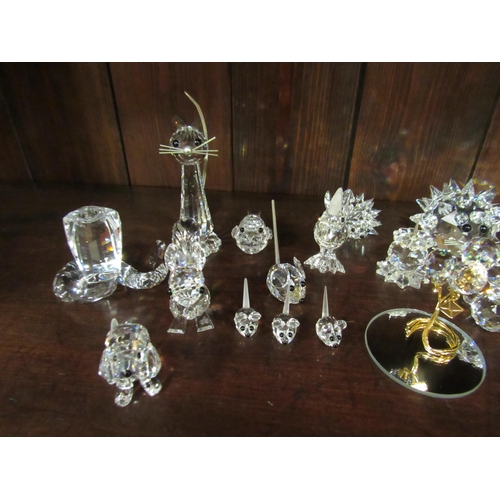 4121 - A large collection of Swarovski crystal animals: hedgehog family, owl family, mice family, etc. (32)... 