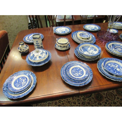 4160 - A good quantity of Booths Real Old Willow pattern dinner and tea wares including plates, tureen, cof... 