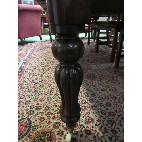 4161 - A Victorian mahogany extending dining table, two extra leaves, melon fluted legs to ceramic castors,... 