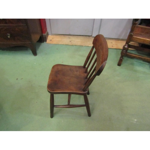 4196 - A circa 1860 elm and ash child's stickback chair, 67cm high    (R) £35